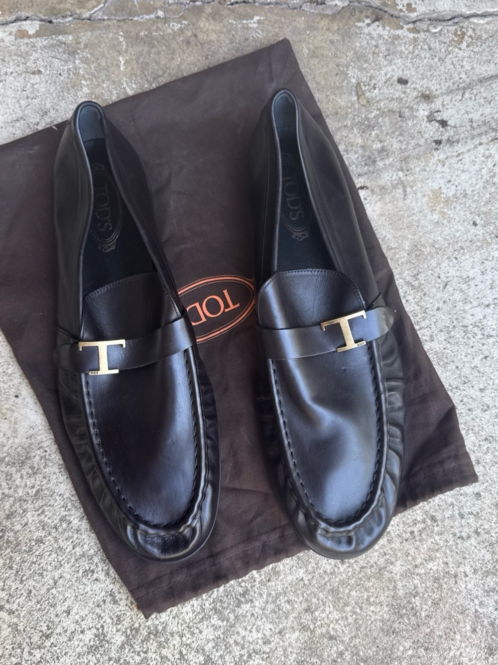Tod's Black Leather Loafers with Gold T-Bit